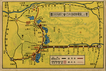 富士山麓電気鉄道開通記念絵はがきの封筒に掲載された富士山を取り巻く鉄道路線図(山梨県立博物館蔵)の画像